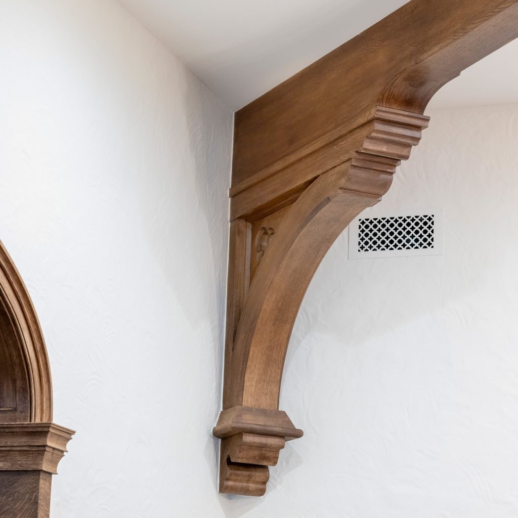 Decorative wood corbel and crown molding, hand-shaped by Rockwood craftsmen for a traditional home in Marietta, Ohio.
