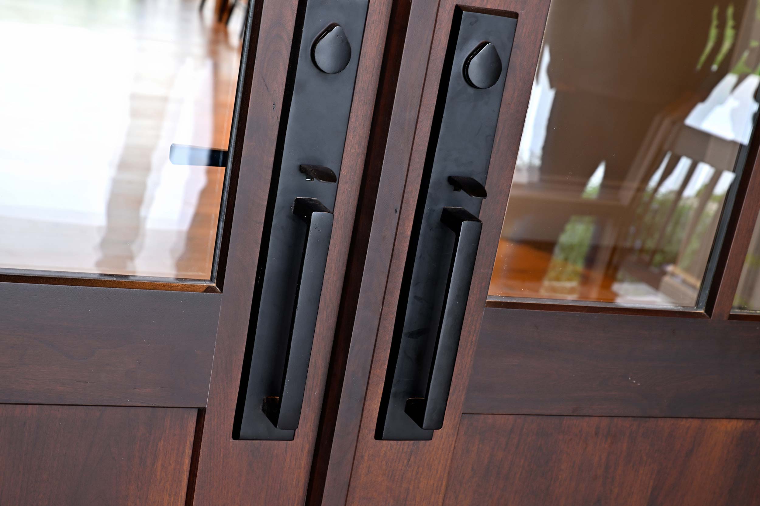 Exterior entry door with weatherproof hardware