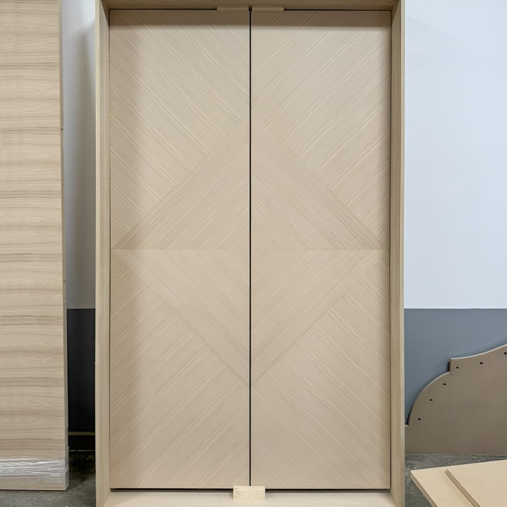 Custom sketch face veneer double doors with geometric grain pattern, handcrafted by Rockwood Door & Millwork in Millersburg, Ohio.