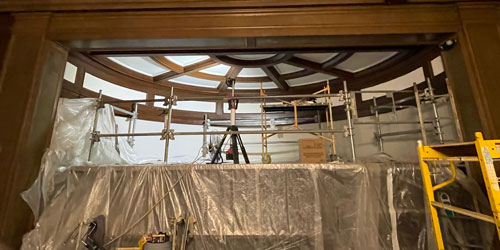 Framed ceiling structure with custom wood beams and scaffolding in place during Rockwood’s millwork restoration project at the Athletic Club of Columbus.