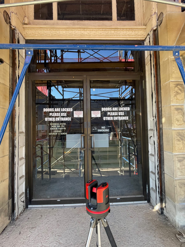 Historic courthouse entrance doors at Perry County Courthouse in Ohio with scaffolding during Rockwood Door restoration work.
