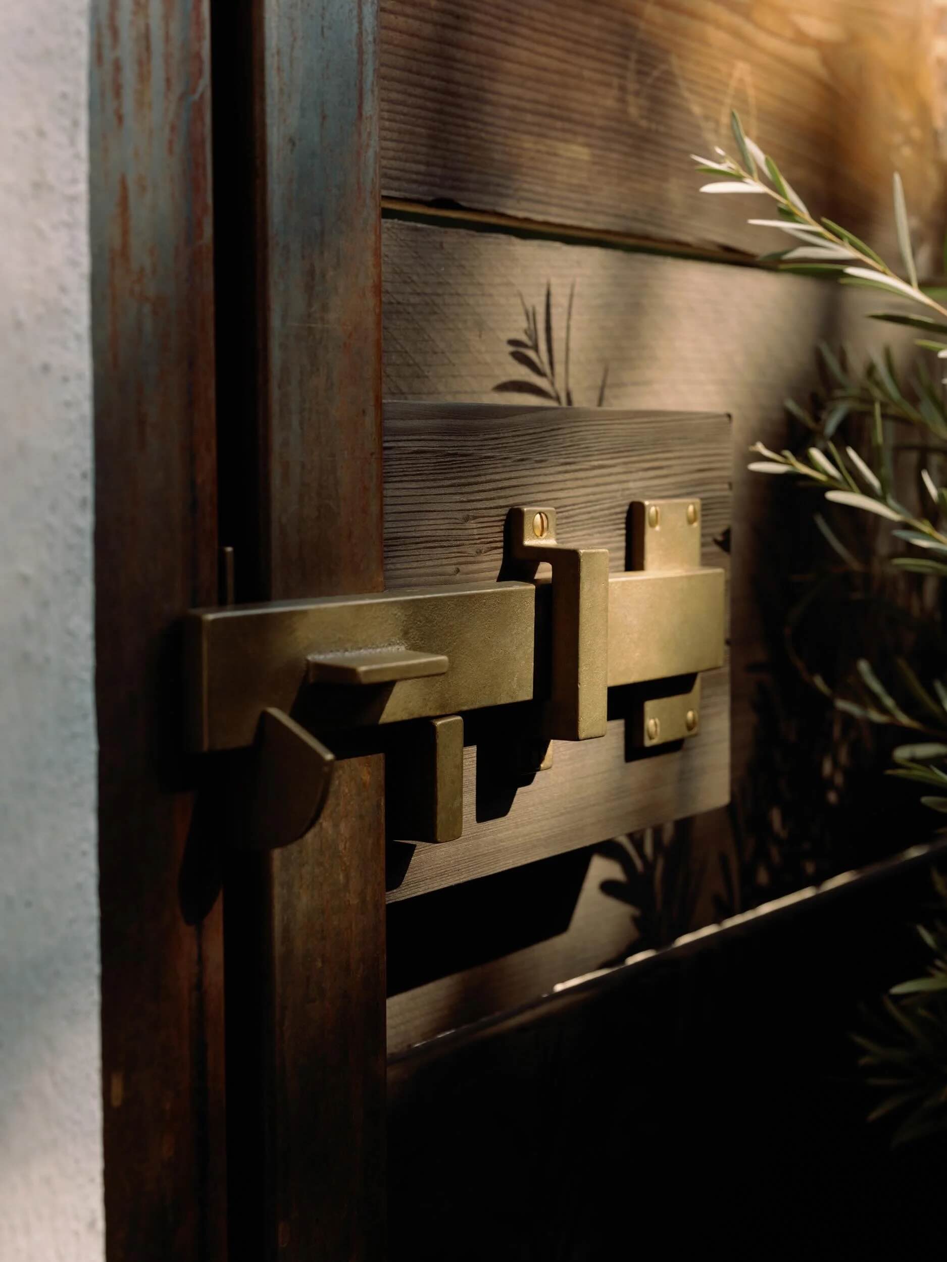Concealed jib door blending into wall paneling