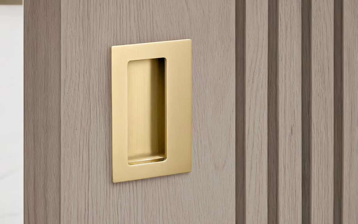 Pocket door with flush pull hardware